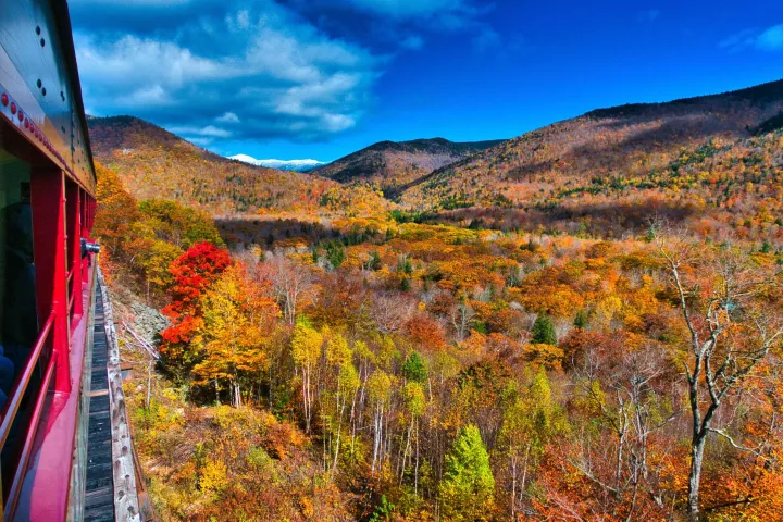 a sign on the side of a mountain