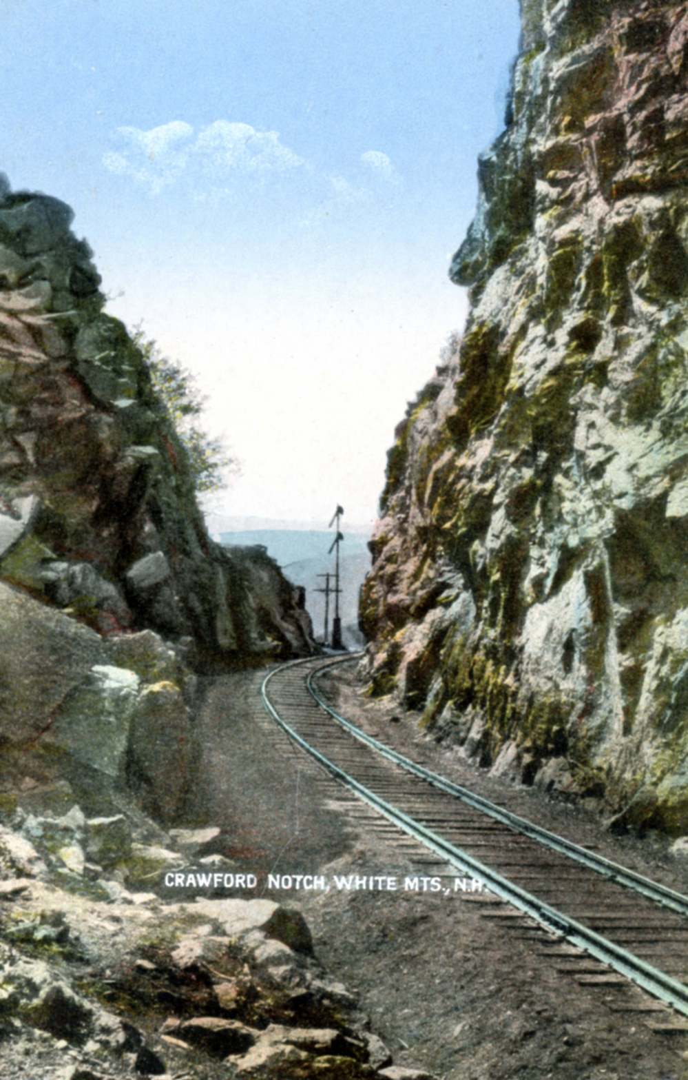 Railway through rocky cliffs at Crawford Notch, White Mountains, NH.